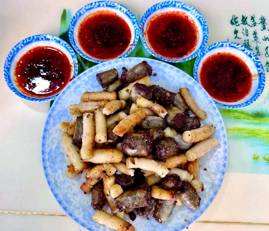 甘肃临夏特色美食_酿皮子手抓羊肉油炸馃馃，风味独特！