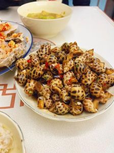 盐焗花螺10分钟能熟吗_盐焗花螺清洗晾干加粗盐，火候到位真弹牙！